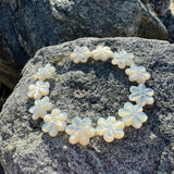 Floral bracelet on a textured stone surface
