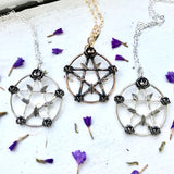 pentacle pendant with twigs and flowers