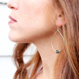 tear drop rose earrings worn on red head model