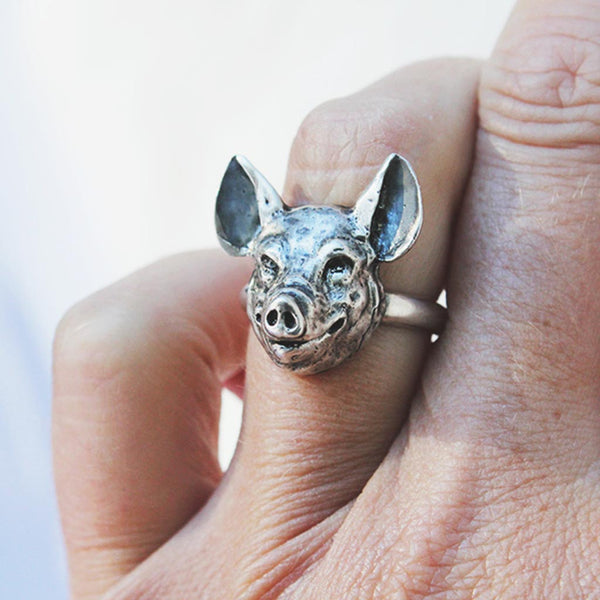 sterling silver ring with a pig face