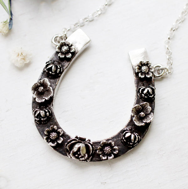 sterling horseshoe pendant with flowers